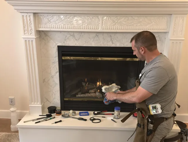 Fountain Chimney Sweep performing fireplace maintenance in Fountain, CO